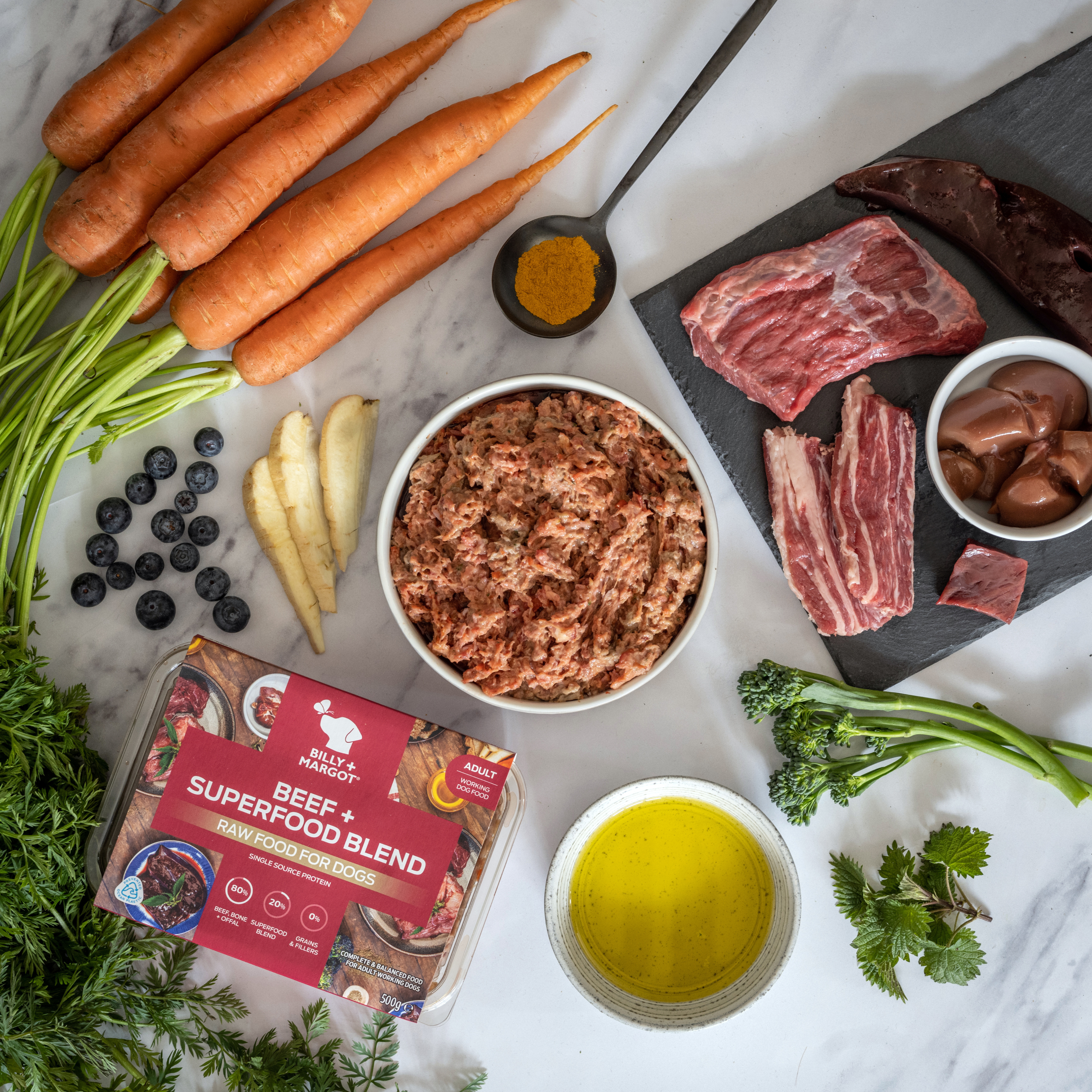 beef raw dog food ingredients 100% natural with prime cuts of beef meat, bone and ox offal with seasonal vegetables and our natural superfood blend